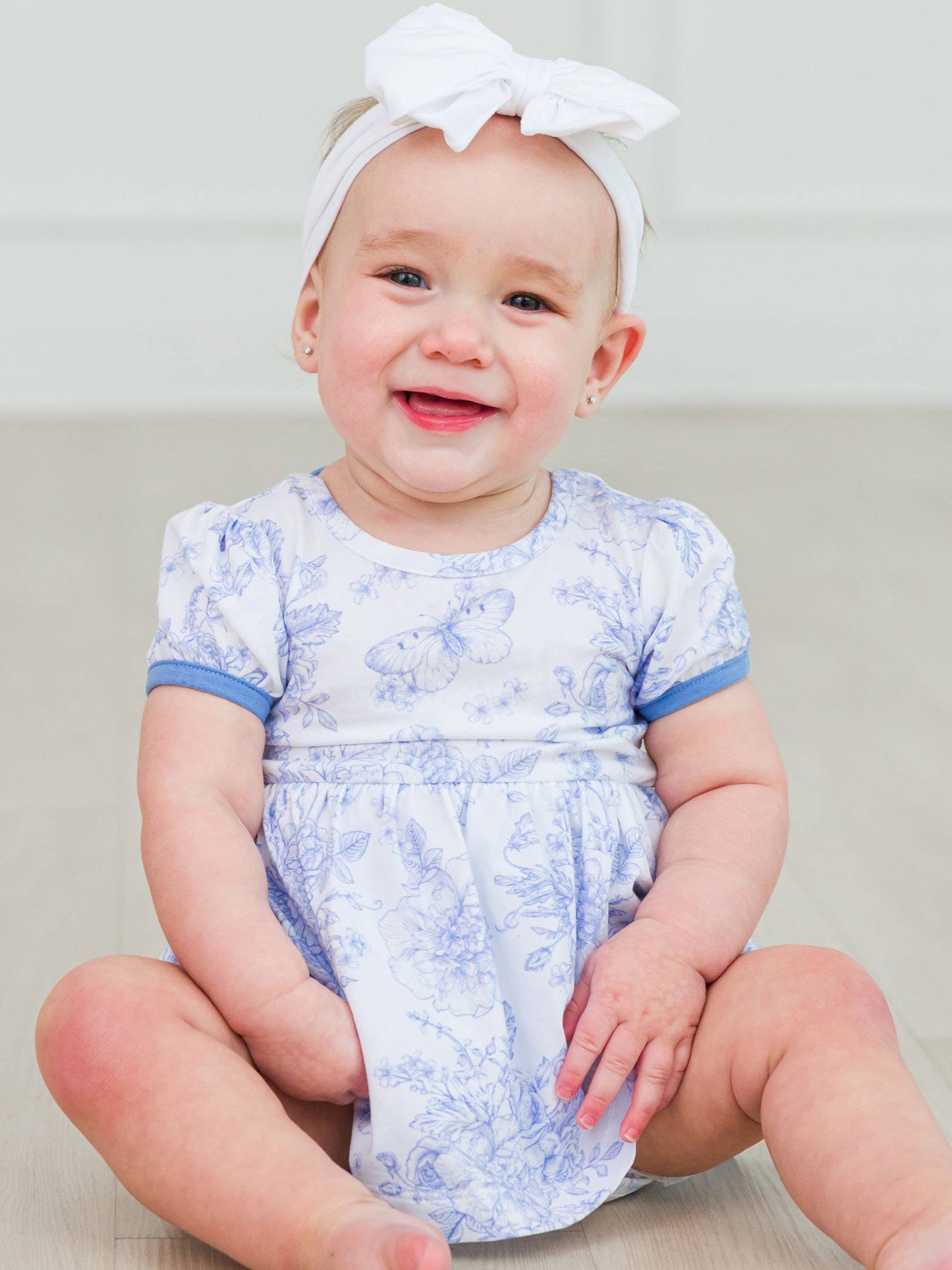 Baby Girls Periwinkle Blue Butterfly Garden Toile Short Sleeve Bow Twirl Romper
: Blue / 12-18m